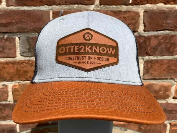 Customer 112 style custom trucker hat with leather patch logo